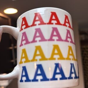 Rainbow mug with the letter a